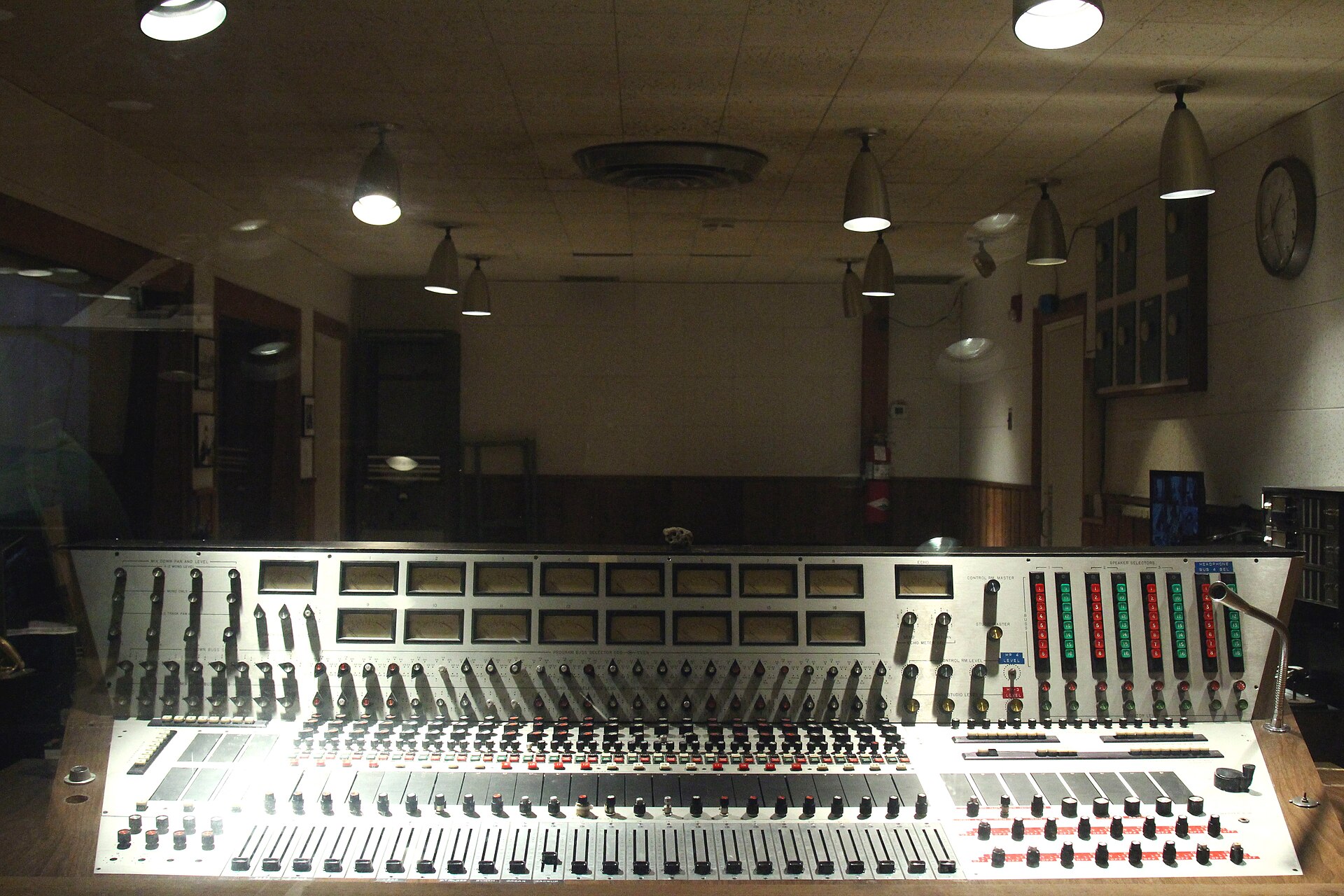 A pipe organ console is shown in a church, relating to the history of sound technology in Indian cinema.